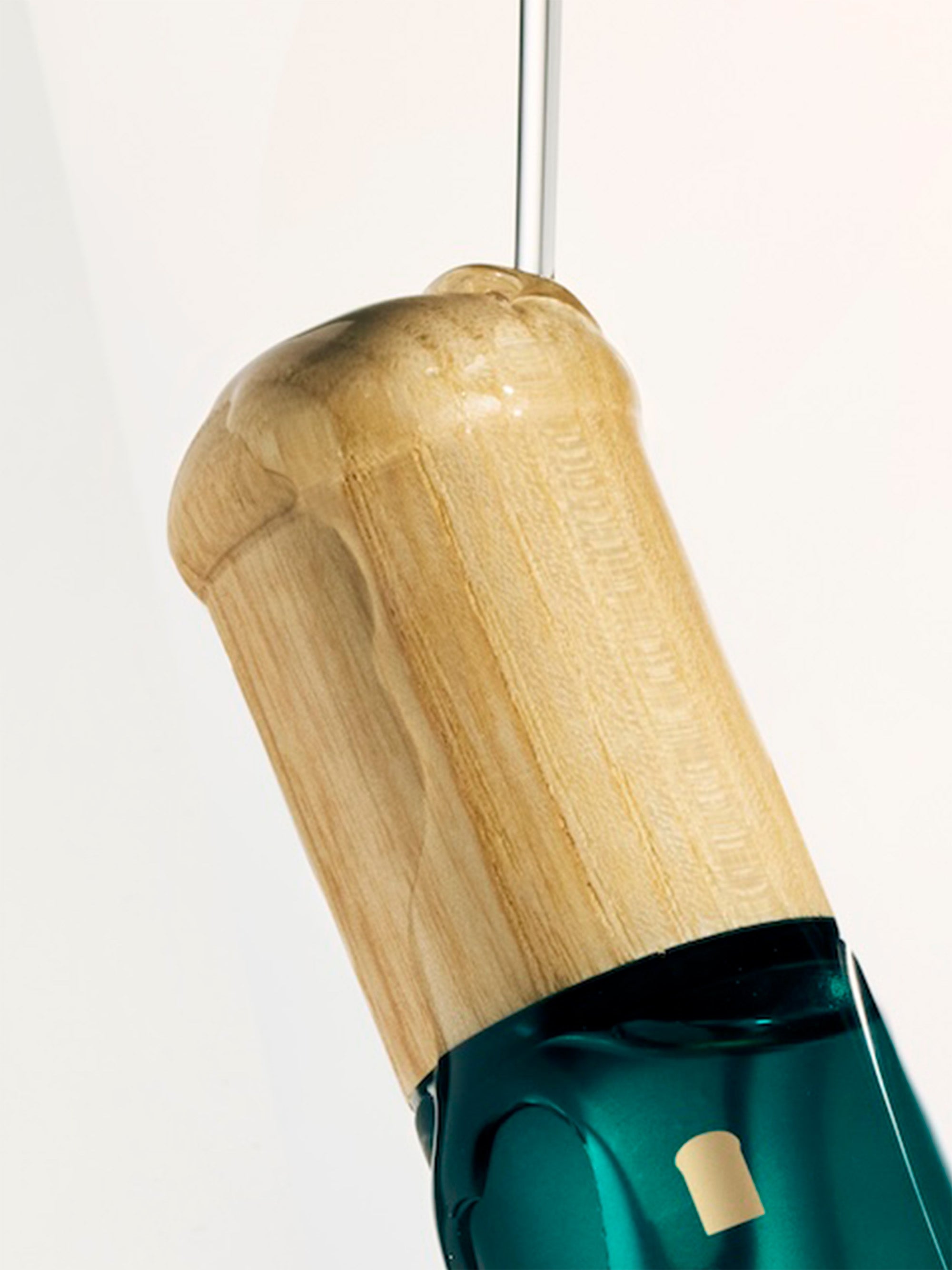 Woodcap rounded tip detail — smooth curved edge, skin-safe rounded tip close-up